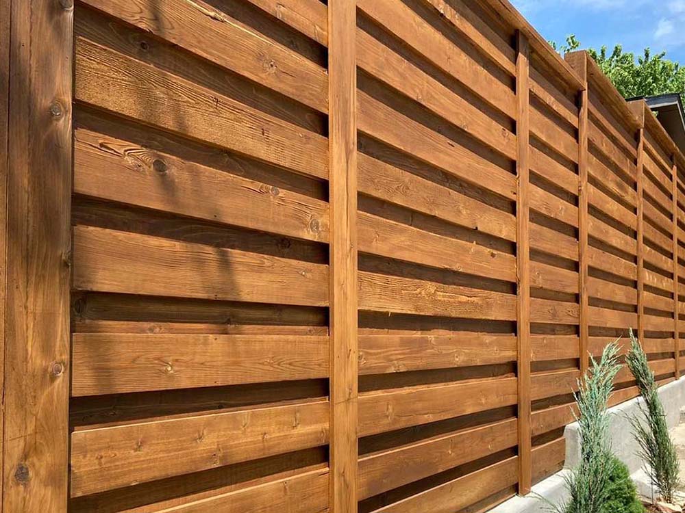 This Town OK cap and trim style wood fence